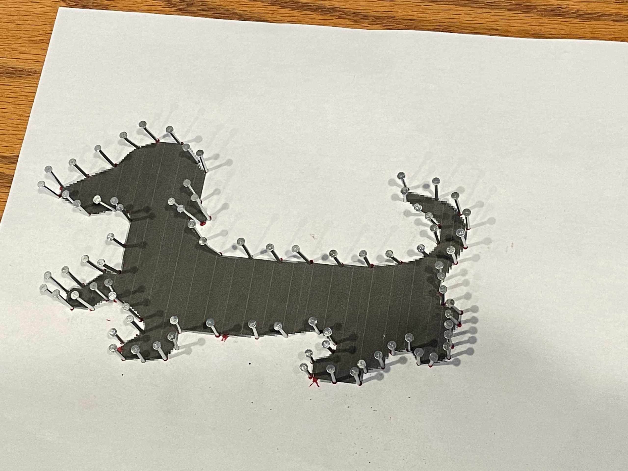 How to make string art dachshund