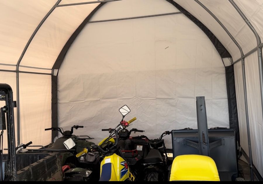 Back Of Filled Shelter Logic Carport Tent
